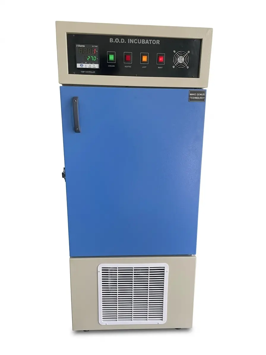 A laboratory B.O.D. incubator used for industrial and environmental testing, featuring a rectangular, insulated metal cabinet with a front-opening door. Inside, stainless steel shelves hold sample bottles for biochemical oxygen demand analysis. The unit includes a digital temperature control panel, typically set around 20°C, with internal air circulation for uniform cooling and heating. Commonly used in wastewater treatment plants, laboratories, and quality control facilities.”